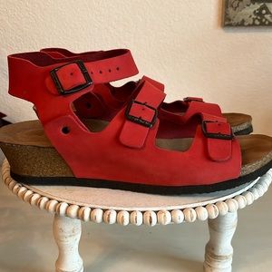 Ballerin’s handmade sandal.  Red with black metal buckle cork soles.
